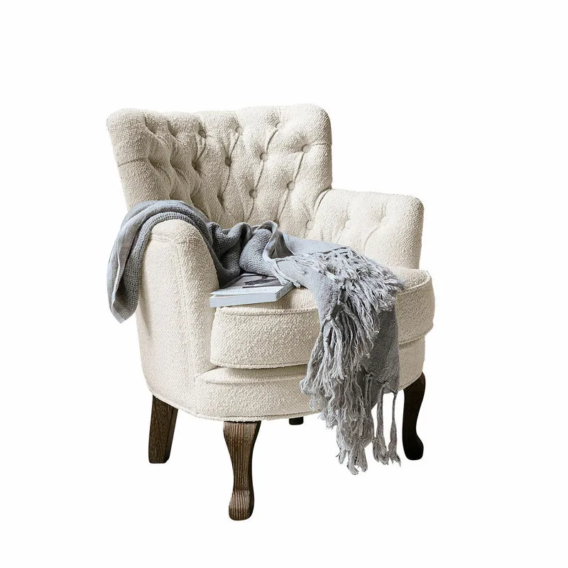 Fauteuil capitonné LOBERON Calgary en tissu bouclette crème