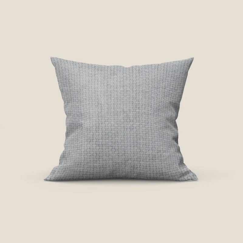 Montana coussin disponible en différentes couleurs en tissu à trame grosse et imperméable T10 gris clair