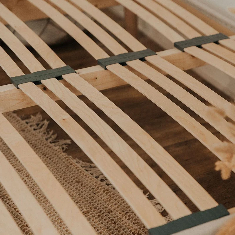 Sommier tapissier beige en bois avec lattes flexibles
