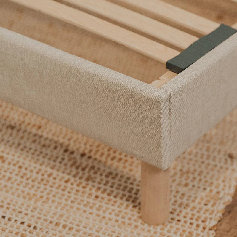Sommier tapissier beige en bois avec lattes flexibles