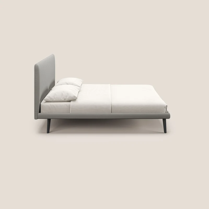 Noel lit minimaliste scandinave avec pieds foncés et tissu flammé imperméable T19 beige
