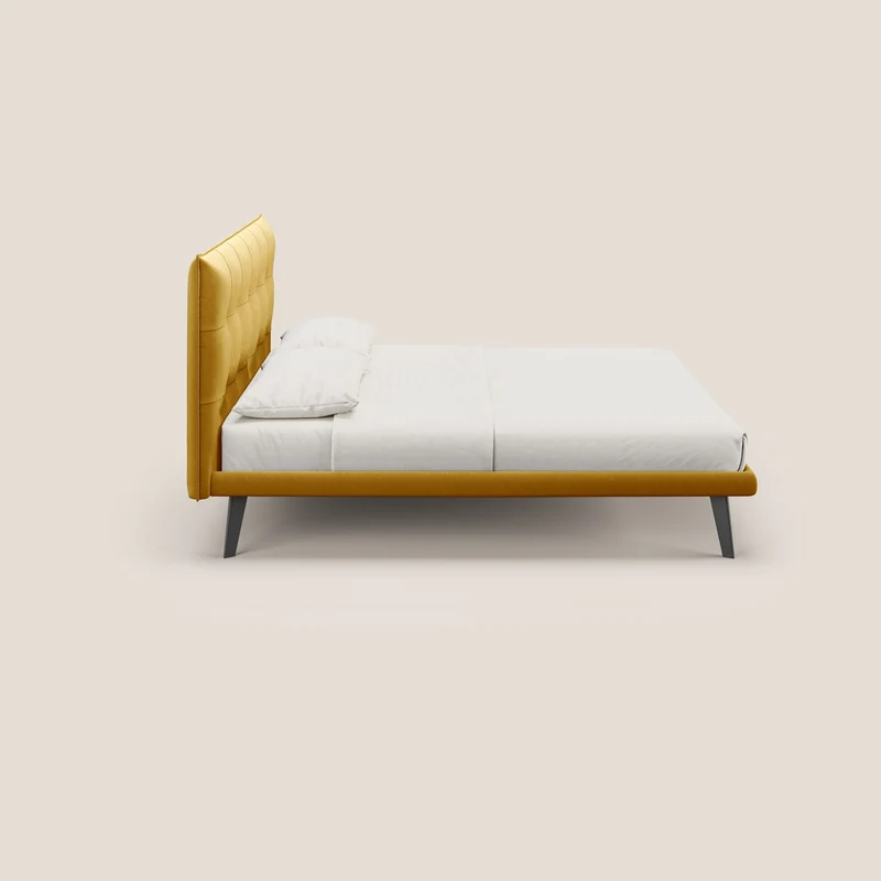 Brigitte lit avec tête de lit matelassée pieds hauts foncés et tissu imperméable T09 jaune