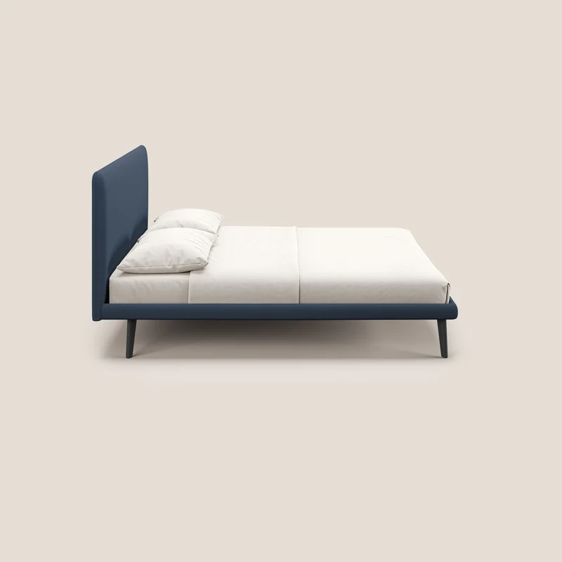 Noel lit minimaliste scandinave avec pieds foncés et tissu flammé imperméable T19 bleu