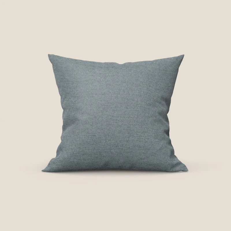 Tobago coussin disponible en différentes couleurs en tissu flammé effet coton imperméable T19 bleu pastel