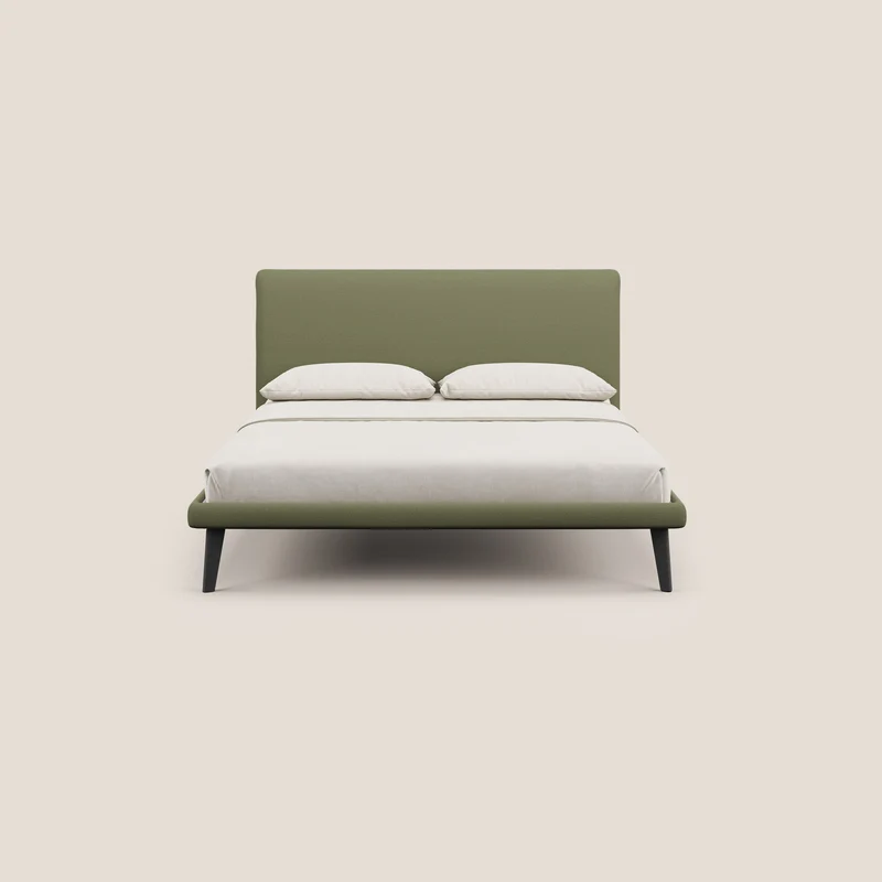Noel lit minimaliste scandinave avec pieds foncés et tissu flammé imperméable T19 vert