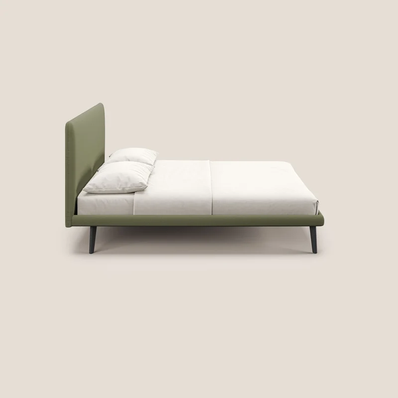 Noel lit minimaliste scandinave avec pieds foncés et tissu flammé imperméable T19 vert