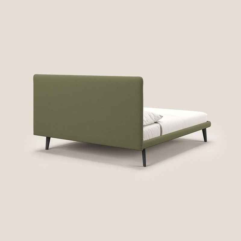 Noel lit minimaliste scandinave avec pieds foncés et tissu flammé imperméable T19 vert