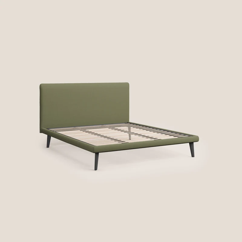 Noel lit minimaliste scandinave avec pieds foncés et tissu flammé imperméable T19 vert
