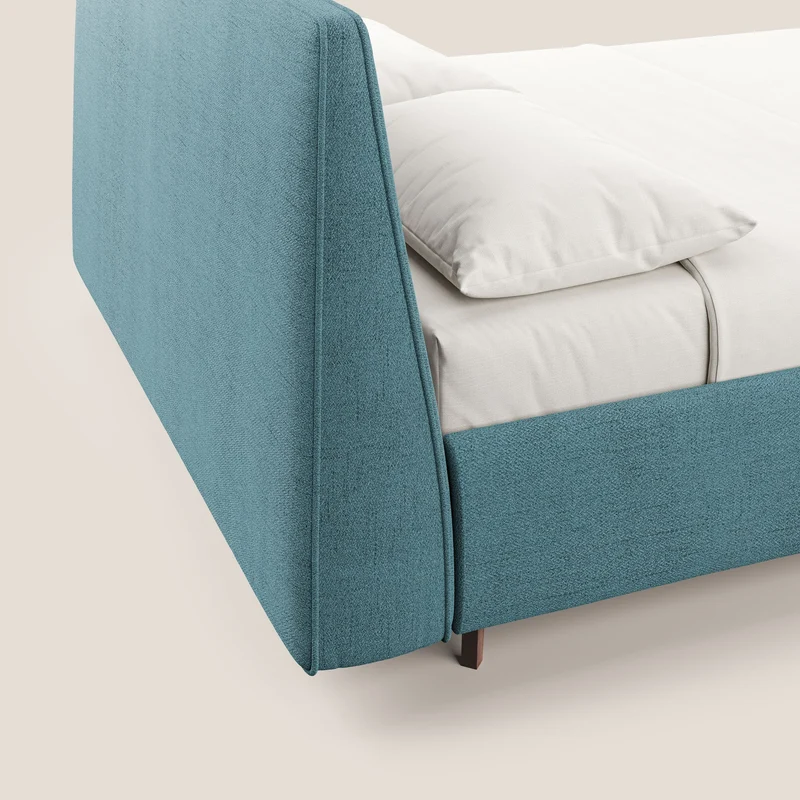 Justin lit rembourré avec coffre et déhoussable en tissu flammé imperméable T03 bleu clair