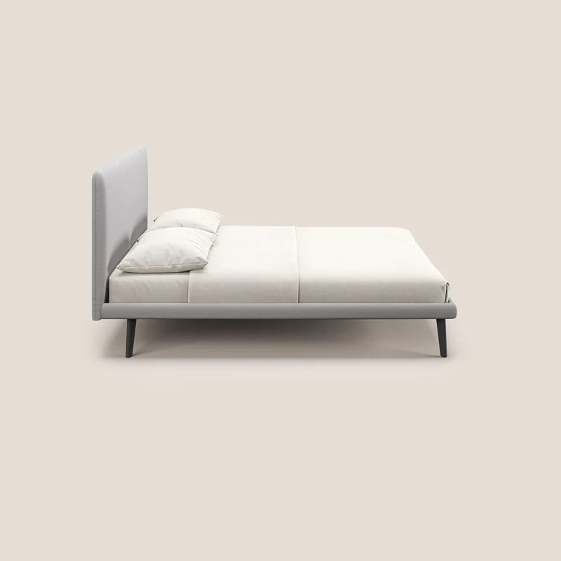 Noel lit minimaliste scandinave avec pieds foncés et tissu flammé imperméable T19 gris