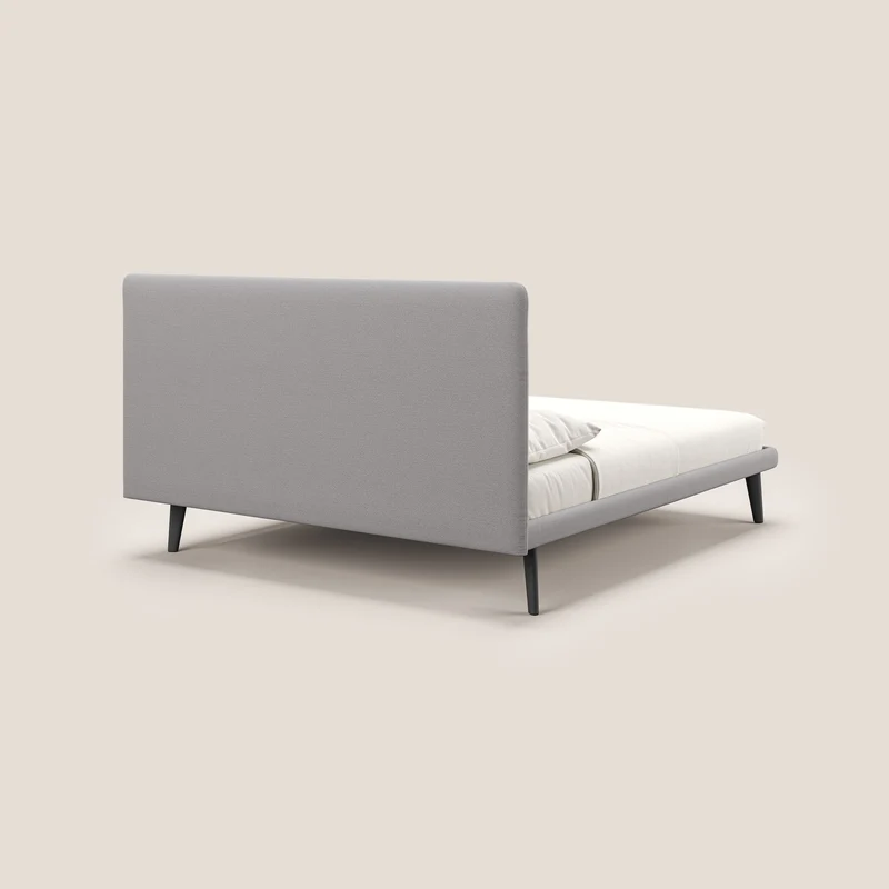 Noel lit minimaliste scandinave avec pieds foncés et tissu flammé imperméable T19 gris