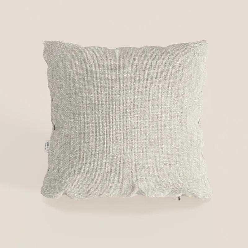 Lyon coussin disponible en plusieurs couleurs, réalisé en tissu tressé imperméable et doux T06 crème
