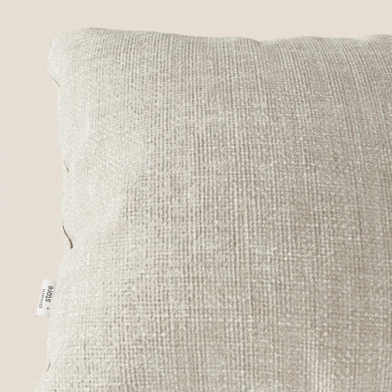 Lyon coussin disponible en plusieurs couleurs, réalisé en tissu tressé imperméable et doux T06 crème