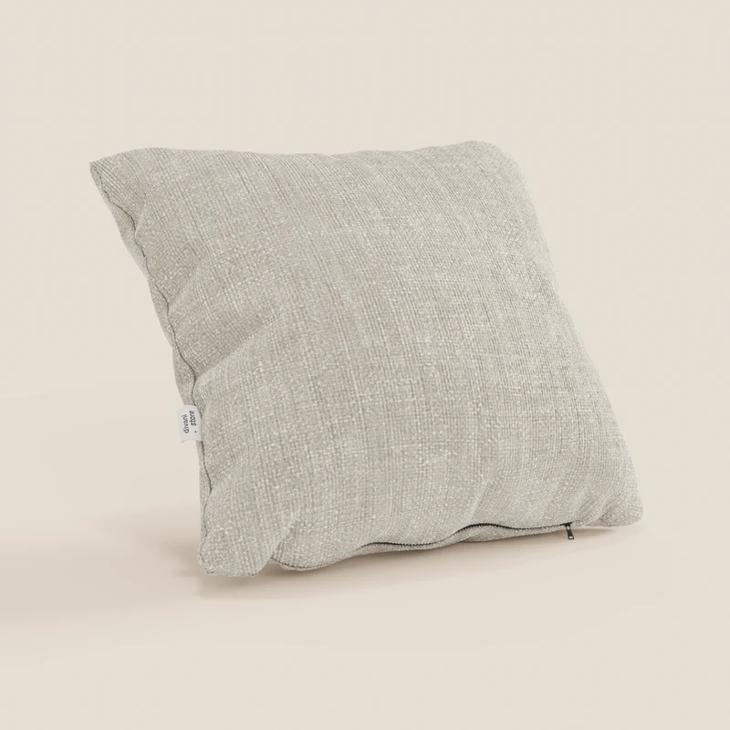 Lyon coussin disponible en plusieurs couleurs, réalisé en tissu tressé imperméable et doux T06 crème