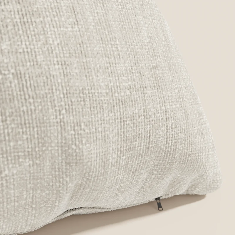 Lyon coussin disponible en plusieurs couleurs, réalisé en tissu tressé imperméable et doux T06 crème