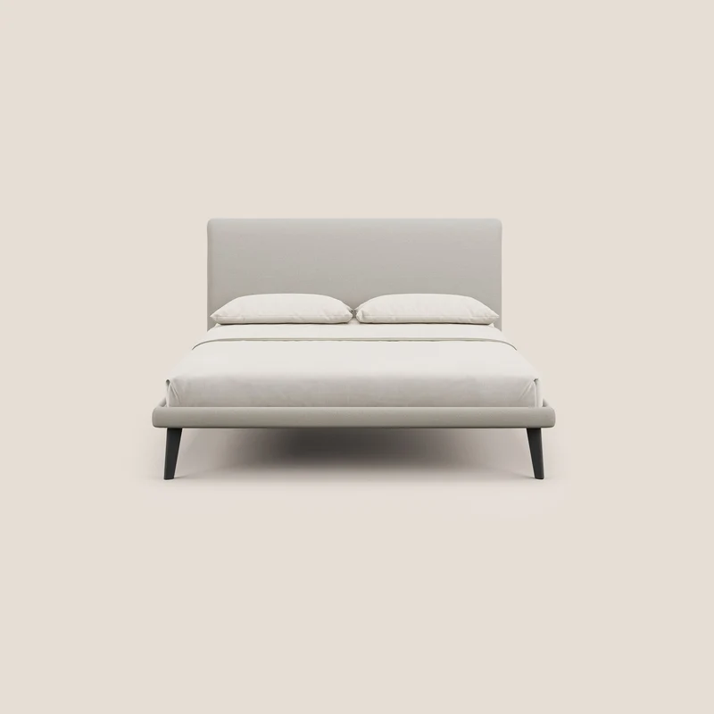 Noel lit minimaliste scandinave avec pieds foncés et tissu flammé imperméable T19 crème