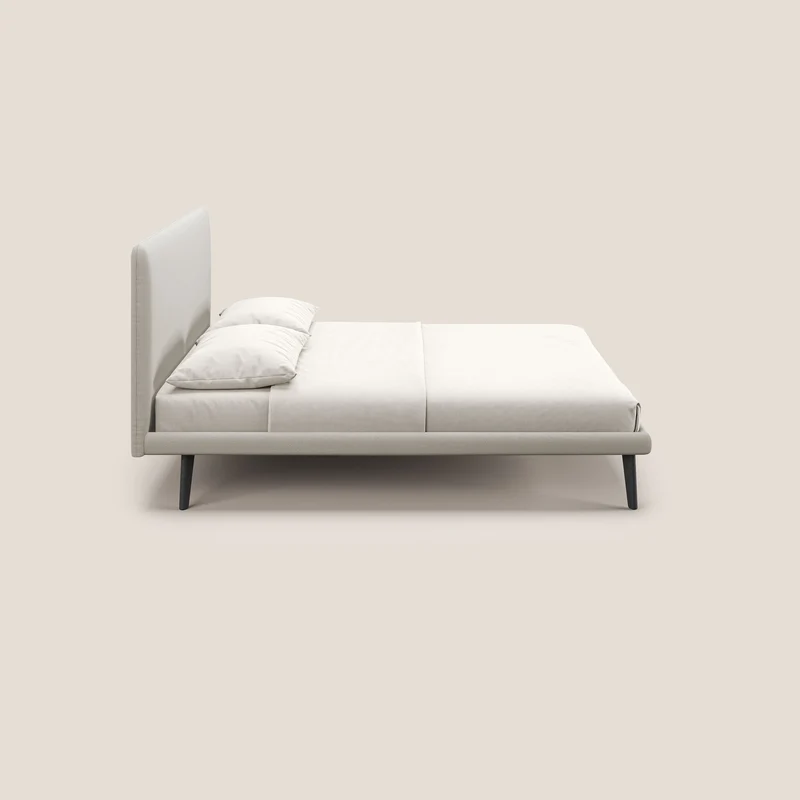 Noel lit minimaliste scandinave avec pieds foncés et tissu flammé imperméable T19 crème