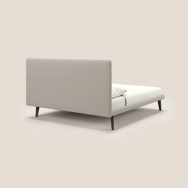 Noel lit minimaliste scandinave avec pieds foncés et tissu flammé imperméable T19 crème