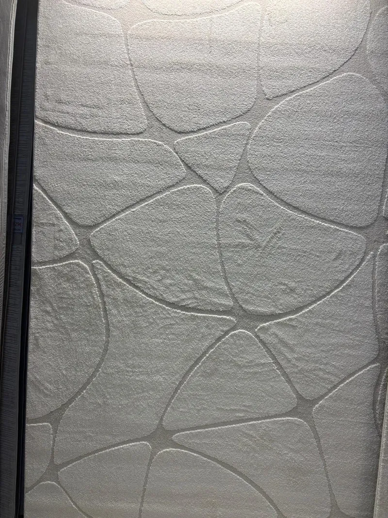 Tapis Elio creme Merinos – Confortable et Sobre Design Galet