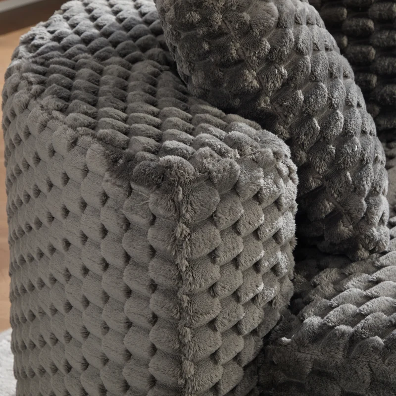 Fauteuil géant gris foncé en fausse fourrure avec pouf assorti en demi-lune FLOATING IRON MAX