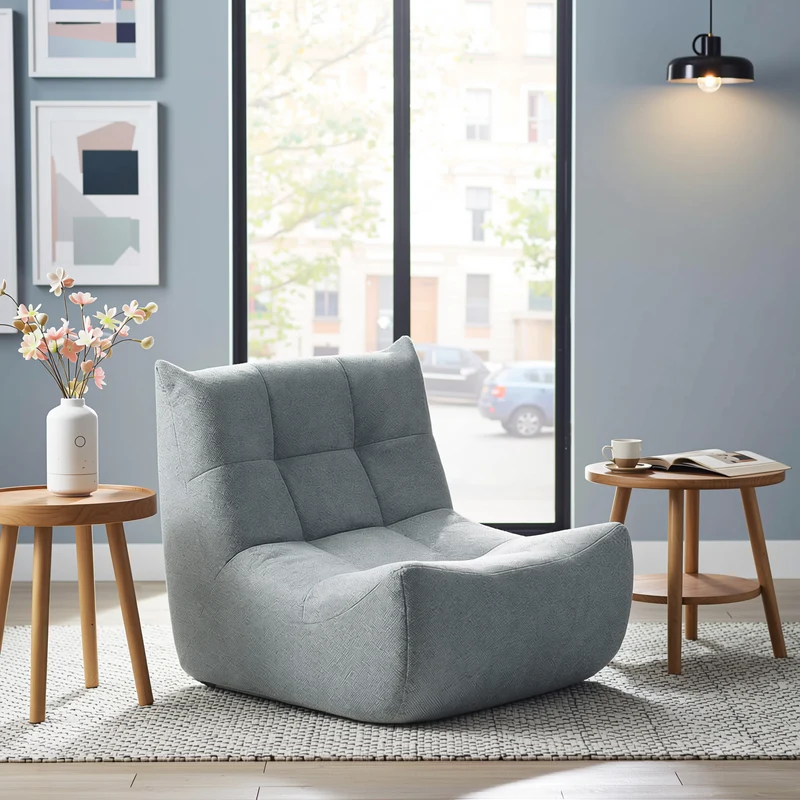 Fauteuil chauffeuse capitonné en tissu chenille gris, mousse mémoire CALCIUMCASCADE