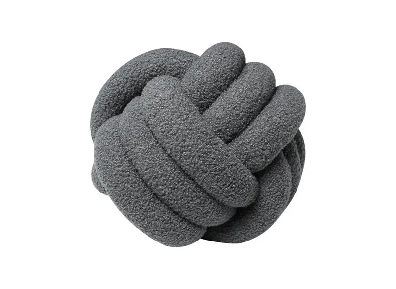 Coussin rond décoratif boule de nœud en effet peau de mouton gris foncé NODUS